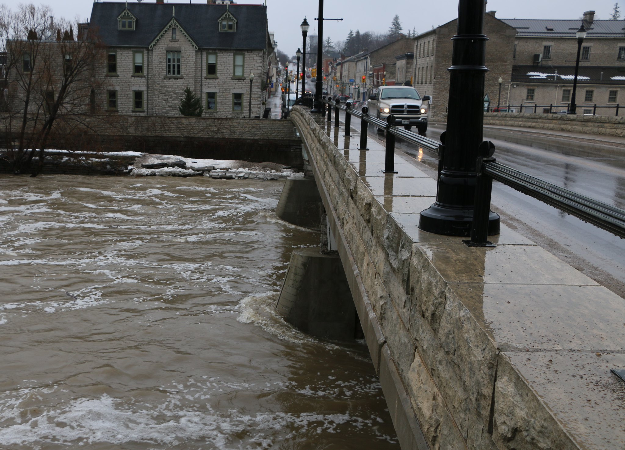 The Thames River flooding under a bridge in St. Marys Ontario.